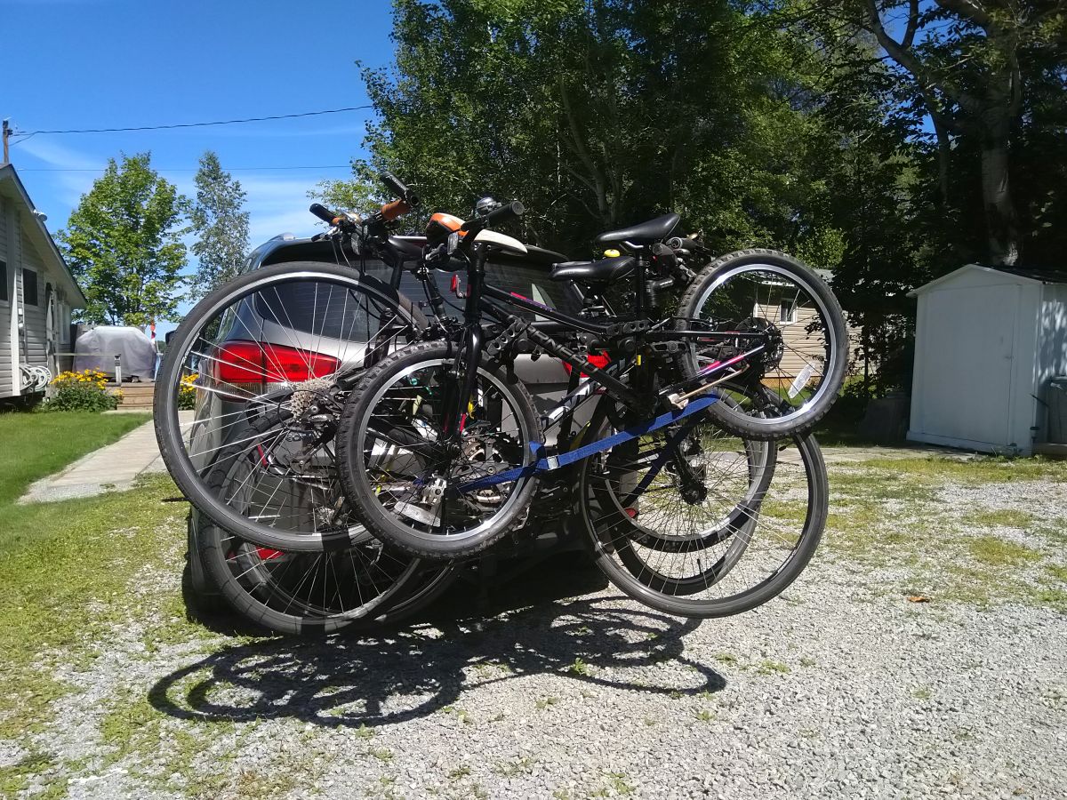 bikes mounted on a car