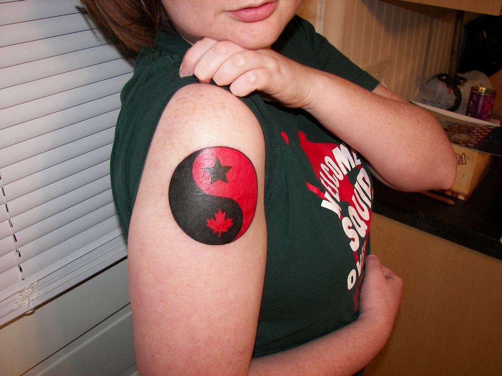 US-Canada red & black yin-yang tattoo