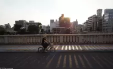cycling-at-sundown,-Hiroshima