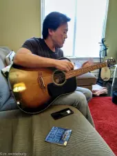 Michael-Chen-plays-guitar