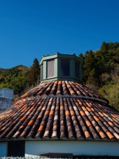 faux-tile-roof-under-a-blue-sky