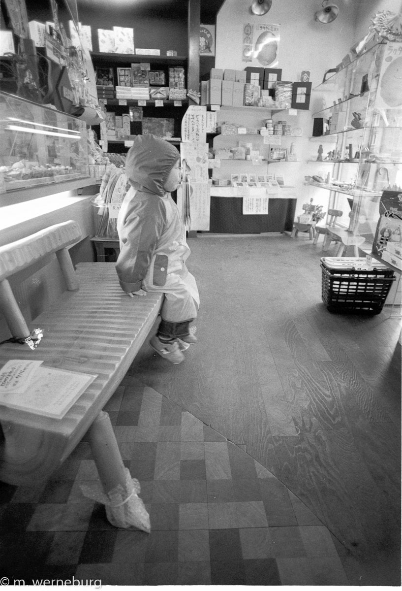 kenny waiting in a store