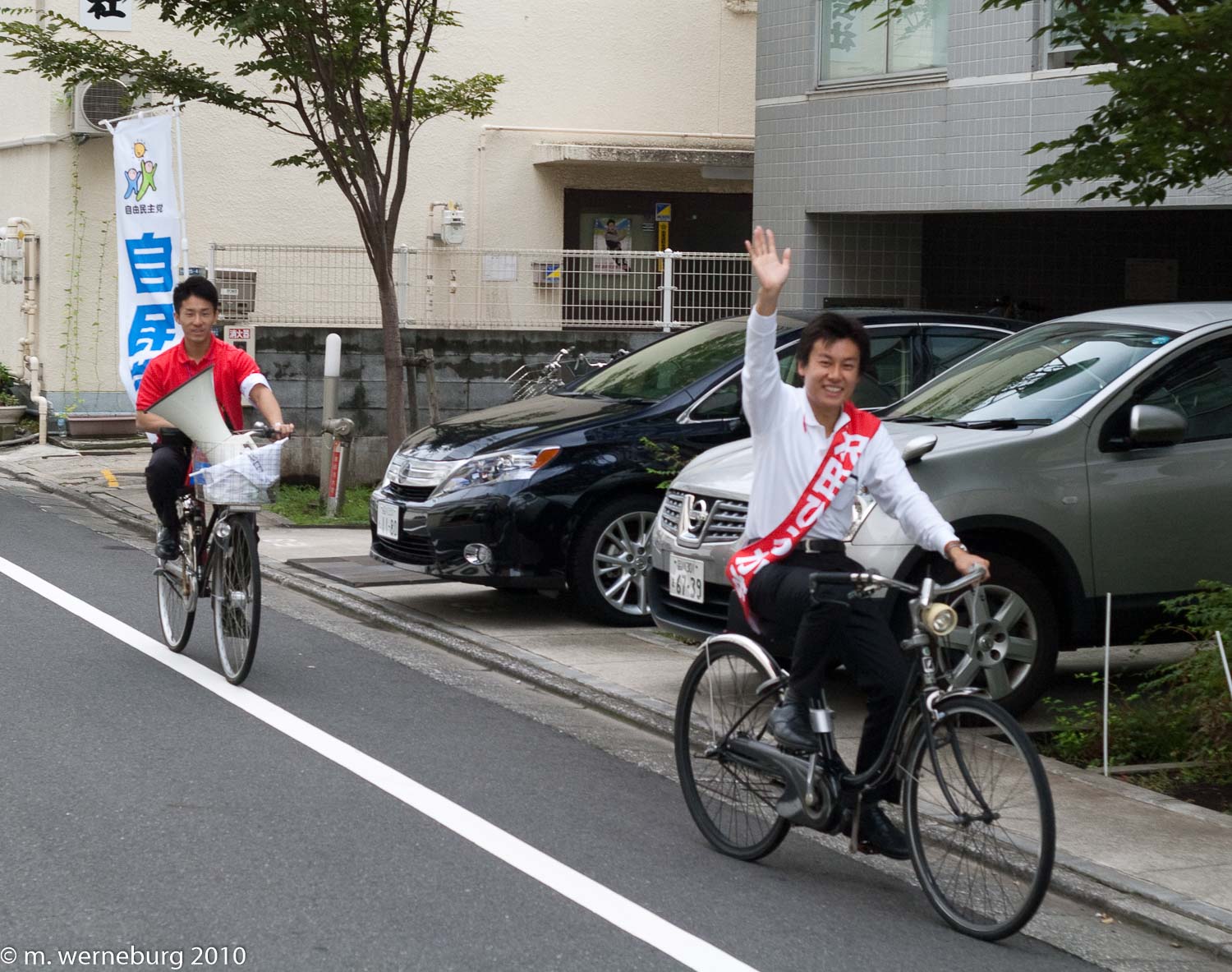 politician on a bike in Tokyo