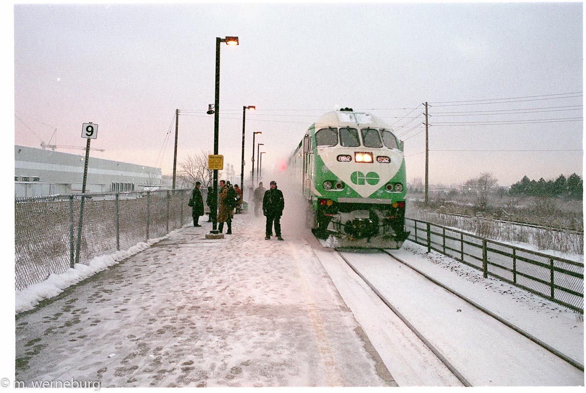 a goa train arrives in a cloud of snow