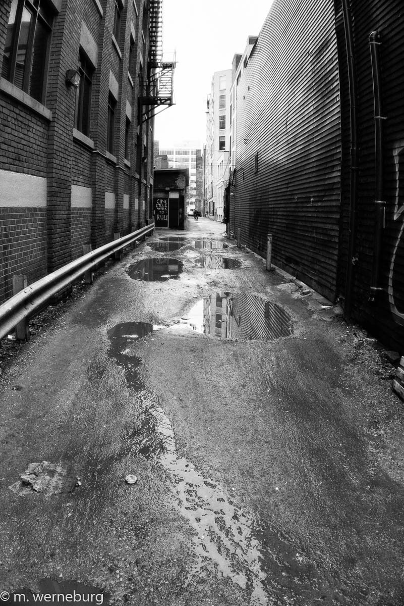 puddles in a winter alley