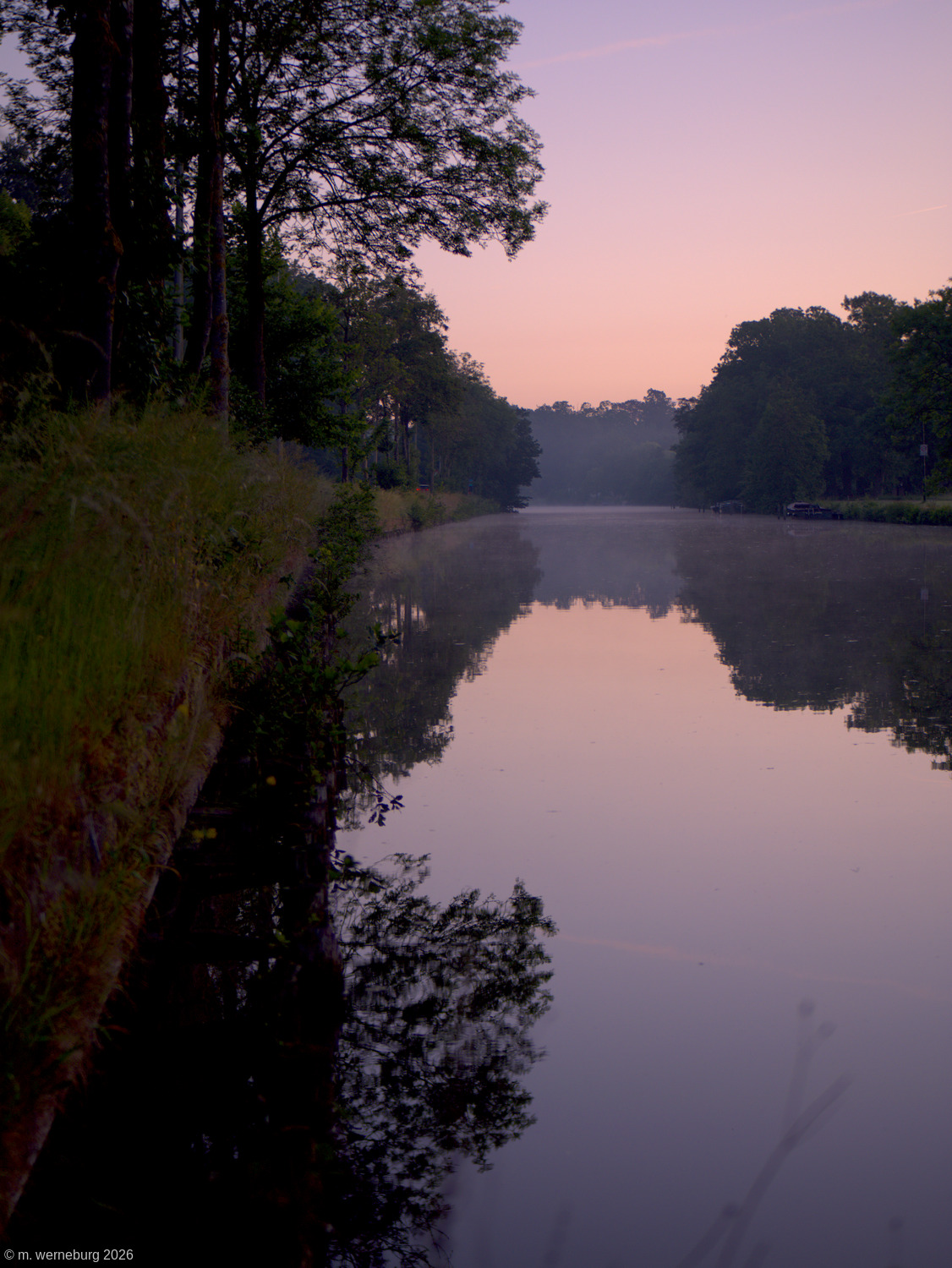 the dawn gathers over a river