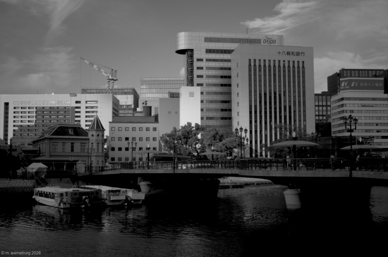 buildings by a river